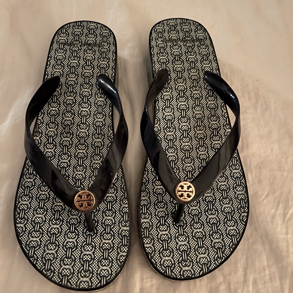 Tory Burch navy wedge flip flops. Size 10- barely worn. Excellent condition.